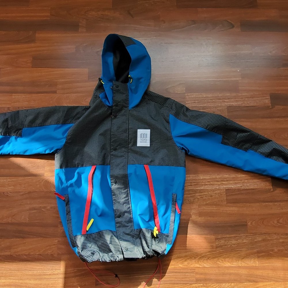 Topo Designs Blue and Black Checkered Raincoat with Red Accents